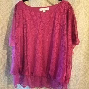 Fuschia blouse with lace.